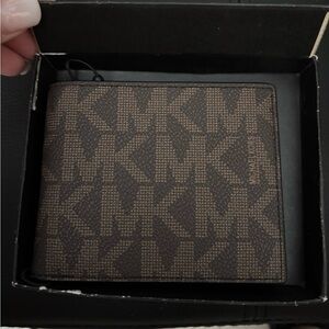 MK Michael Kors Jet Set men's billfold wallet $98 USD